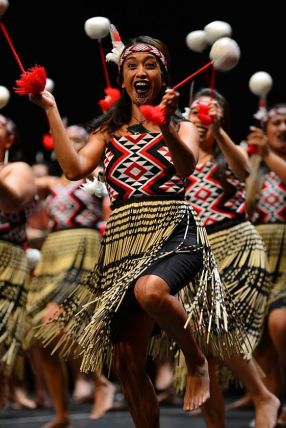 Maori welcome - poi dancers